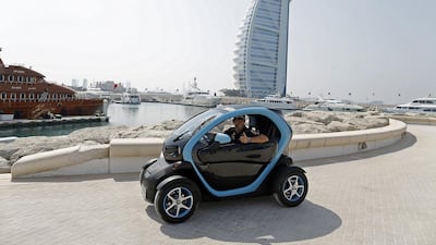 Infiniti Red Bull Racing’s Mark Webber cruised through Dubai in a battery-powered electric vehicle – the Renault Twizy. Photo Courtesy-Renault