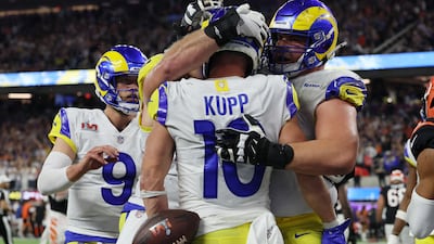 Los Angeles Rams' Cooper Kupp celebrates scoring a touchdown with teammates. Reuters