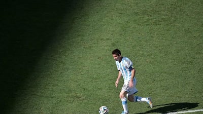 Argentina's Lionel Messi controls the ball against Switzerland at the 2014 World Cup round of 16 on Tuesday. Gabriel Bouys / AFP