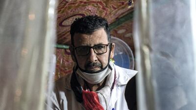 Dr Al Abadi works through most of the night, sometimes sleeping for only 2 to 3 hours per day. Luke Pierce for The National