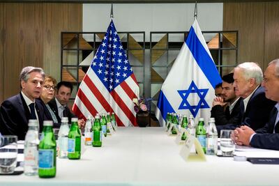 US Secretary of State Antony Blinken, left, meets former Israeli army chief of staff Gadi Eisenkot, right, and former Israeli Defence Minister Benny Gantz, second right, in this file photo. Mr Gantz has threatened to quit Israel's goverment. AFP