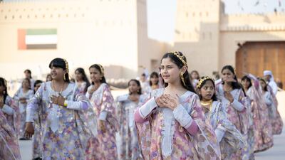 Emirati girls dance in the Union Parade. Rashed Al Mansoori / Presidential Court