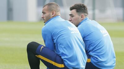 Barcelona forwards Munir El Haddadi, right, and Sandro Ramirez attend a training session on Friday ahead of the team’s return from the international break. Andreu Dalmau / EPA