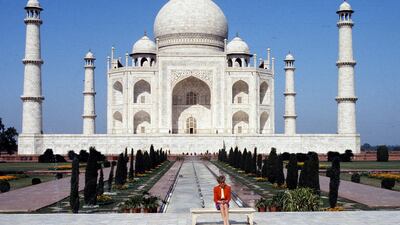 Princess Diana poses alone at the Taj Mahal during her visit to India, in 1992.