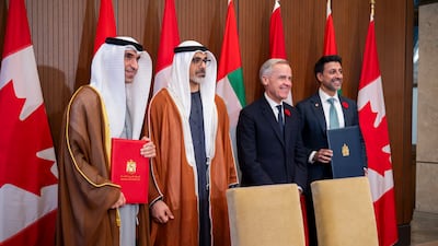 Sheikh Khaled and Mr Carney witness the signing of Canada-UAE comprehensive economic partnership agreement by Dr Al Zeyoudi and Maninder Sidhu, Canada’s Minister of International Trade