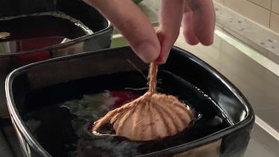Use gauze, flowers and an old stocking to create floral applique on eggs