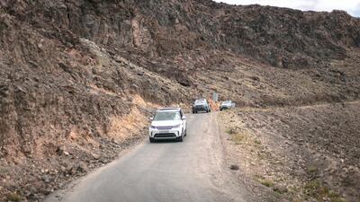 The convoy moves downhill.