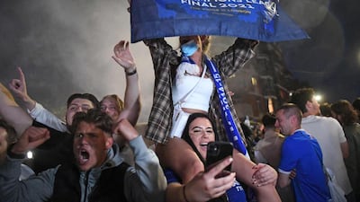 Chelsea supporters celebrate in streets surrounding their Stamford Bridge stadium in London their Champions League victory. AFP