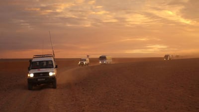 A Syrian Arab Red Crescent aid convoy drives to the Rukban camp on the border with Jordan on November 4, 2018. Syrian Arab Red Crescent via AP