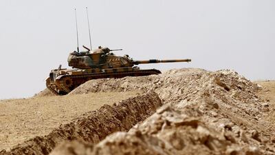 Turkish tanks prepare for a military operation at the Syrian border as part of their offensive against ISIL and Kurdish forces in Syria. EPA/SEDAT SUNA