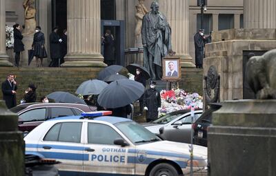 Actors and film crew, some wearing face masks or coverings due to the Covid-19 pandemic, work on the movie set of 'Tha Batman' being shot at George's Hall in Liverpool, north west England. AFP