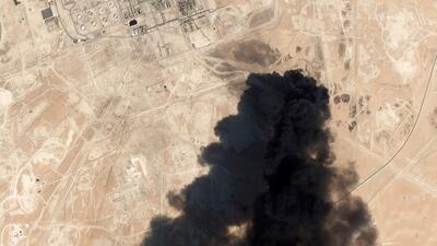 Satellite image from Planet Labs Inc. shows thick black smoke rising from Saudi Aramco's Abqaiq oil processing facility in Buqyaq. Planet Labs Inc via AP, File