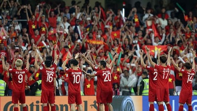 Vietnamese players acknowledge their fans after winning the 2019 AFC Asian Cup group D football match against Yemen on January 16, 2019. AFP