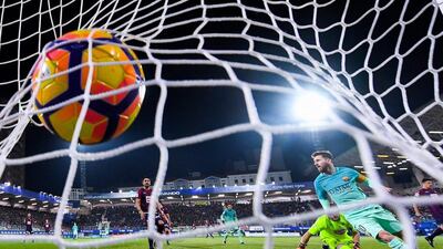 Lionel Messi scores Barcelona’s second goal against Eibar. David Ramos / Getty Images