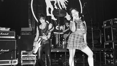 Kathleen Hanna, right, and drummer Tobi Vail, centre, of the group Bikini Kill, with Joan Jett, left, in New York City in 1994. Ebet Roberts / Redferns