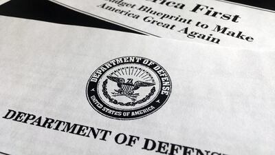 A portion of President Donald Trump’s first proposed budget, focusing on the Department of Defense, and released by the Office of Management and Budget, is photographed in Washington, Wednesday, March 15, 2017. Jon Elswick / AP