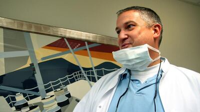 File photo of Dutch dentist, Jacobus Van Nierop, in his dental office in Chateau-Chinon, France. Dutchman Jacobus Van Nierop dubbed the “Dentist of horror” by French media went on trial on March 8, 2016, facing charges of intentional violence and fraud after scores of victims came forward with complaints ranging from multiple healthy teeth removed, pieces of tools left in teeth, abscesses to recurrent infections between 2009 and 2013. Christophe Masson/AP Photo