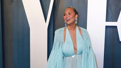 Chrissy Teigen, wearing Georges Hobeika, arrives at the Vanity Fair Oscar party on Sunday, February 9, 2020. EPA
