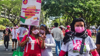 Supporters of Philippine presidential candidate Leni Robredo attend a campaign rally in Makati, in suburb Manila. AFP
