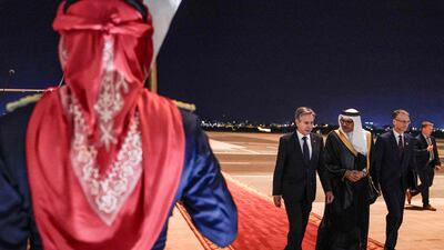Mr Blinken is received by Bahrain's Foreign Minister Abdullatif bin Rashid and US Ambassador to Bahrain Steven Brody, in Manama. AFP