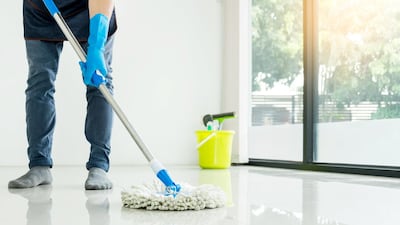 We should be aiming to mop floors at least once a week. Getty Images