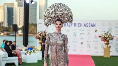 Fashion by Filipino designers Jose and Aldwin Guardiana.