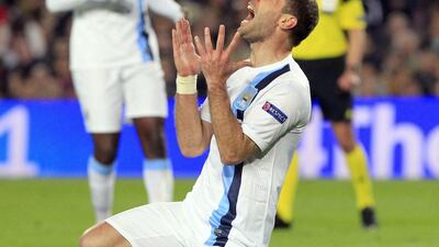 Pablo Zabaleta reacts during Manchester City's loss to Barcelona on Wednesday night. Toni Albir / EPA / March 12, 2014