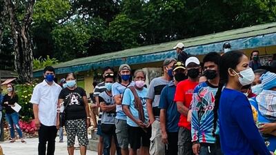 Dubai resident Jess Manglicmot, far left in a white shirt, is in the Philippines on holiday. He accompanied his mother, Carmen, to a polling station in Cotabato city on Monday. Photo: Jess Manglicmot