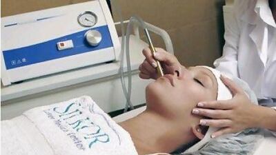 A woman undergoes diamond micro-dermabrasion treatment at Silkor centre. Courtesy Silkor Laser Medical Center