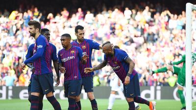 Arturo Vidal celebrates his opening goal against Getafe with his Barcelona teammates. Getty Images