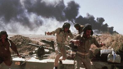 An Iraqi tank crew during an Iranian air strike in Abadan, Iran in October 1980. The eight year Iran-Iraq war, which ended in 1988 continue to define views in both countries of each other AP