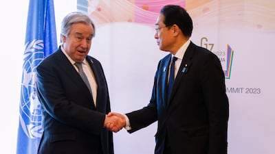 UN Secretary General Antonio Guterres shakes hands with Japan's Prime Minister Fumio Kishida at the G7 Summit in Hiroshima. Getty