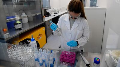 A scientist works at a laboratory in Garin, Buenos Aires province, where an experimental vaccine against Covid-19 developed by the University of Oxford and the AstraZeneca laboratory will be produced for Latin America. AFP