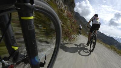 Switzerland's Thomas Tanner, left, and Charly Meier in action during the first stage of the Swiss Epic Race on Monday. Maxime Schmid / EPA