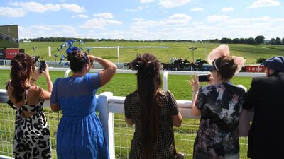 Spectators at the Epsom Downs Racecourse. EPA