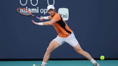 Andy Murray returns a shot against Tomas Machac at the Hard Rock Stadium in Miami. AFP