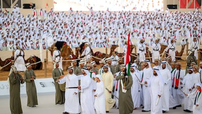 HH Lt Gen Sheikh Saif bin Zayed Al Nahyan, Deputy Prime Minister and Minister of Interior, participates in a traditional ayyala, during the Union Parade, at the Sheikh Zayed Heritage Festival. Seen with Sheikh Khalifa bin Tahnoun, Executive Director of the Martyrs' Families' Affairs Office, Sheikh Diab bin Tahnoon and Sheikh Hamdan bin Mansour. Eissa Al Hammadi for the Presidential Court