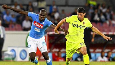 Kalidou Koulibaly, left, has also been linked with Juventus after helping Napoli challenge the Turin club for the Scudetto. Ciro Fusco / EPA