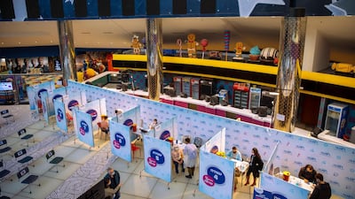 Israelis receive Pfizer Covid-19 vaccine at a movie theatre turned into a coronavirus vaccination center in Beersheba, southern Israel, Sunday. AP Photo