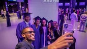 Graduates were 'all smiles' at the New York University Abu Dhabi commencement ceremony, held at Etihad Arena on Yas Island. All photos by Antonie Robertson / The National
