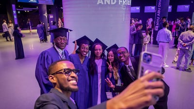 Graduates were 'all smiles' at the New York University Abu Dhabi commencement ceremony, held at Etihad Arena on Yas Island. All photos by Antonie Robertson / The National