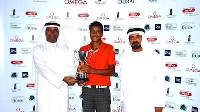 Ahmed Marjane, centre, of Morocco fired a final-round 69 to win the Ras Al Khaimah Classic at Tower Links Golf Club on Wednesday. Courtesy Mena Tour