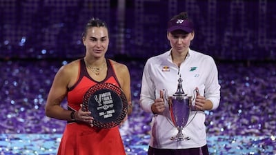 Kazakhstan's Elena Rybakina alongside runner-up Aryna Sabalenka from Belarus. Reuters