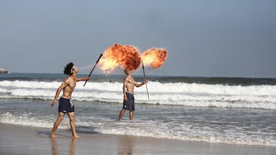 A fire-breathing performance in Gaza. Photo by Majd Mahmoud