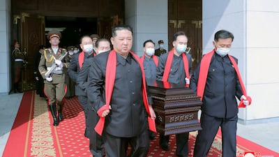 North Korean leader Kim Jong-un carries the casket during the state funeral for marshal of the Korean People's Army and general adviser to the Ministry of Defence, Hyon Chol-hae, in Pyongyang, North Korea, on May 22, 2022. KCNA via Reuters