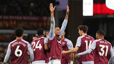 Aston Villa's Ezri Konsa, front, and his teammates celebrate his winner against Wolves in the Premier League game at Villa Park on Saturday, March 30, 2024. PA