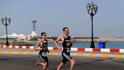 Alastair Brownlee, right, and Jonny Brownlee, left, at the 2014 Abu Dhabi International Triathlon in March. Ravindranath K / The National / March 15, 2014