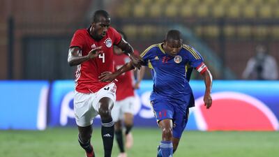 Egypt's Aly Mohamed in action with eSwatini's Tony Tsabedze. Reuters