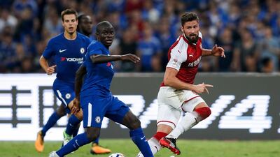 Olivier Giroud of Arsenal passes against N'Golo Kante of Chelsea during the pre-season friendly match at Birds Nest Stadium on July 22, 2017 in Beijing, China. Yifan Ding / Getty Images