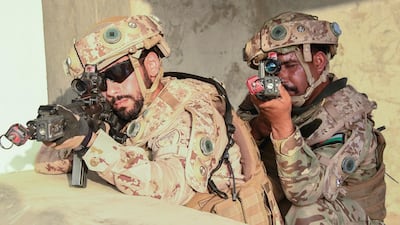 Soldiers from the UAE Armed Forces and the Jordanian Armed Forces participate in a joint military drill.